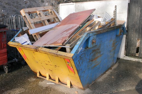 Sorting items during Camden Town house clearance